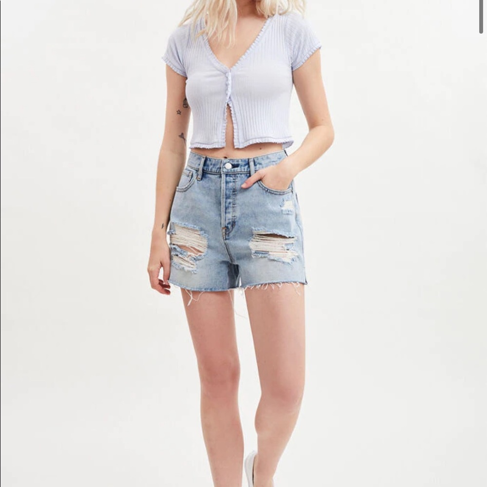 Levi’s high rise mid length ripped butt Jean short